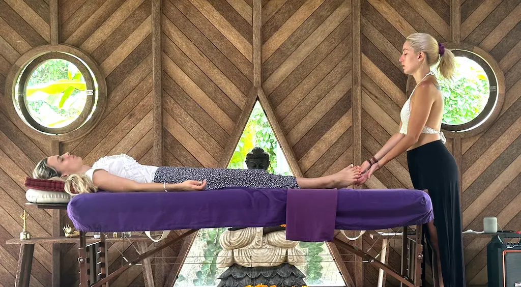Energy healing in a pavilion open to the Balinese nature